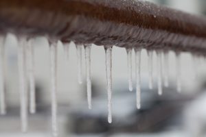icicles-hanging-from-brown-pipe