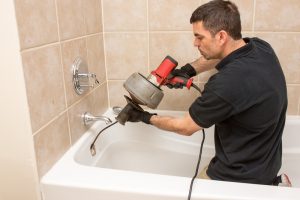 plumber-using-drain-snake