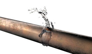 busted-copper-pipe-leaking-water