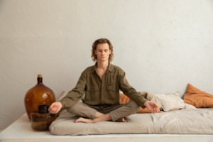 man-in-yoga-pose-enjoying-indoor-environment