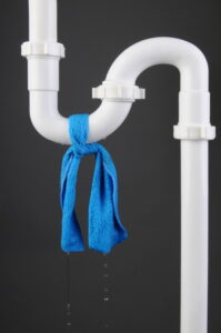 blue-cloth-around-white-pvc-pipe