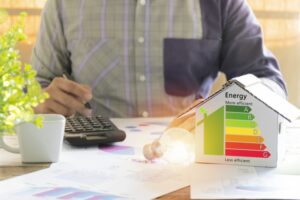 man-calculating-the-energy-savings-of-having-a-more-efficient-home