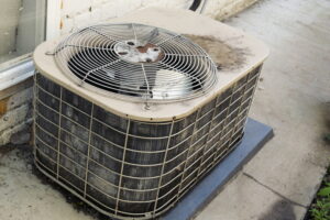 an-old-air-conditioner-outdoor-unit-in-need-of-replacement